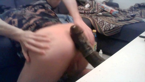 Une webcaméra, béants, travesti