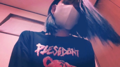 Crossdresser gets a massive facial cumshot during a wild bukkake session